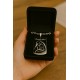 Engraved metal pendant “Family First” with mother and child design