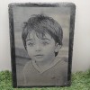 Engrave image on black stone  foe memorial tomp