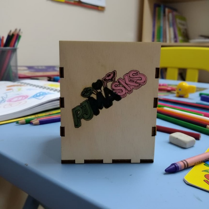 Wooden pencil case with figures