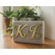 Marble favor box with monogram on plexiglass