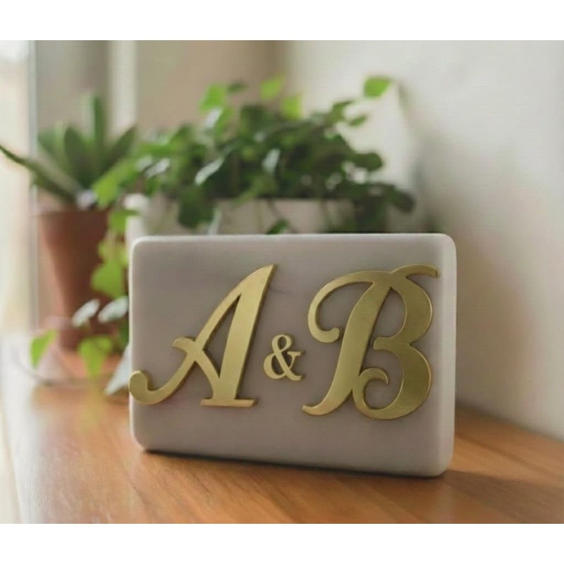 Marble favor box with monogram on plexiglass