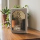Marble element with gold plexyglass with engraved image of Saint Marble favor box with engraved Saint image