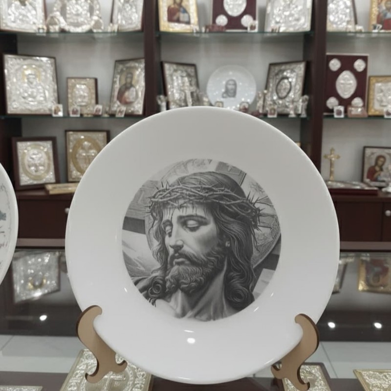 Engraved smaller image of "Jesus with the cross " on plate 