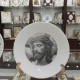 Engraved smaller image of "Jesus with the cross " on plate 