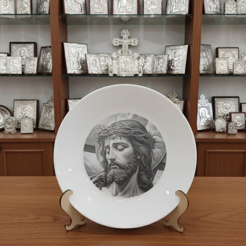 Engraved smaller image of "Jesus with the cross " on plate 