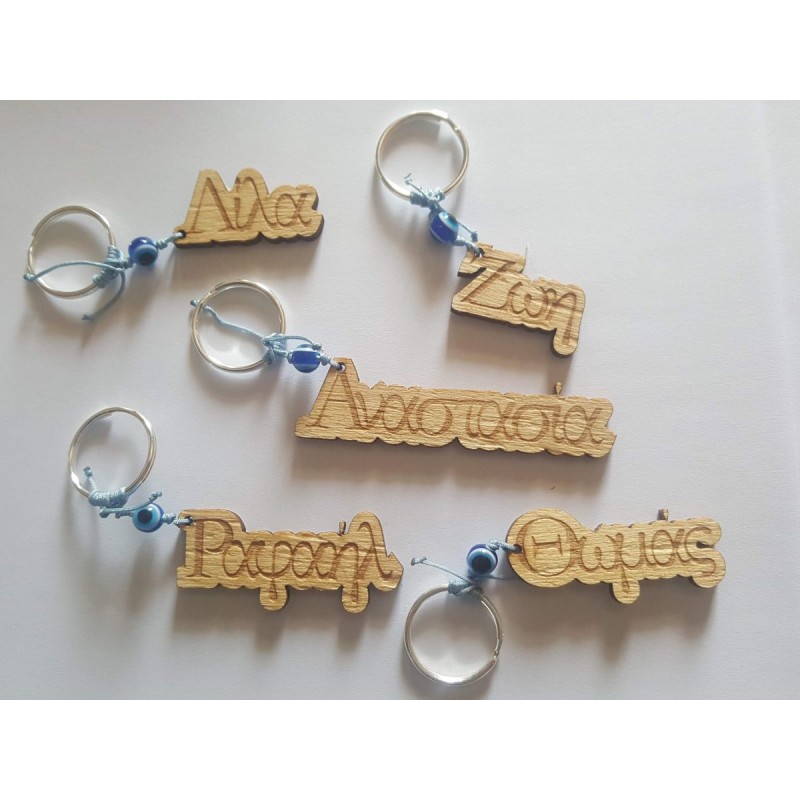 Wooden keychain with name , easy and low cost gifts for personal and profecional use 